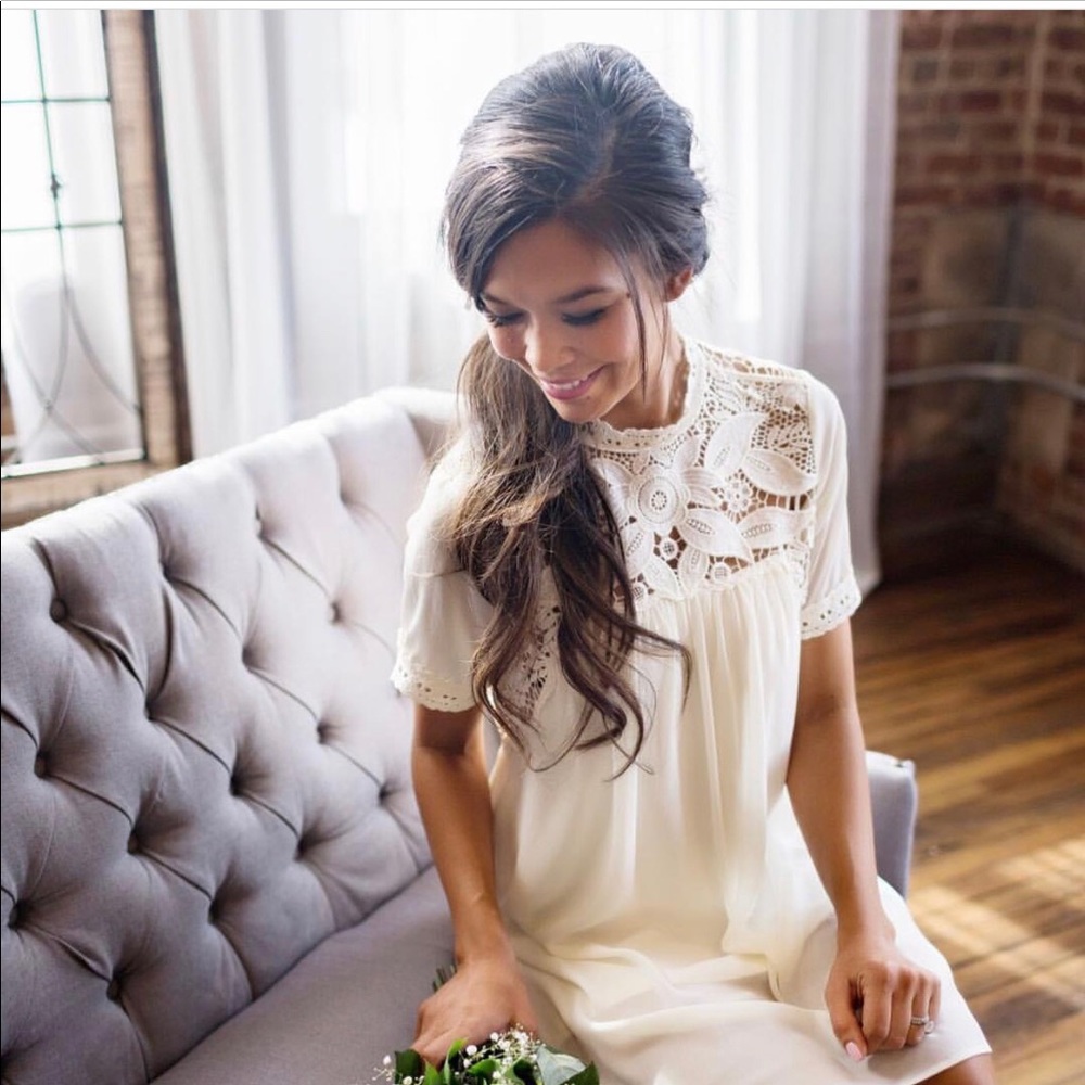 Very cute white dress. Perfect for a bride!!